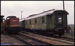 201106 neben einem alten Heizwagen am 21.3.1992 im BW Staßfurt.