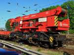 Der 75to. Kran  David  von der Notfalltechnik kommt am 26.05.2012 am Aachener Hbf zum Einsatz. Er mu 146 023 wieder in`s Gleis heben. Die Lok war mit sechs Doppelstockwagen am Haken ber eine Gleishexe gefahren und entgleist.