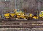 Schotterverteil- und Planiermaschinen Plasser & Theurer SSP 120 der DGU (Deutsche Gleisbau Union), abgestellt am 10.12.2011 in Betzdorf/Sieg.