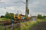 Eine Stopfmaschine der Firma EIFFAGE RAIL ist in Kleinenbroich bei der Arbeit....leider haben irgendwelche Künstler mal wieder keine Leinwand gefunden und sich ersatzhalber an der Maschine vergriffen. 6.7.2014