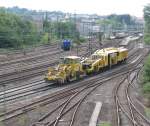 Stopfmaschine und Schotterpflug bei der Durchfahrt im Bahnhof Ludwigsburg Richtung Kornwestheim Rbf.