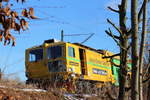 Versteckt sich hinter Geäst die Unimat 09-475/4S Lasch GmbH bei Niederfüllbach am 19.01.2017.