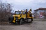 Landschaftsbau Tschauder Unimog 1650 (97 59 99 568 60-6) am 11.03.2012 in Naumburg (S) Hbf.