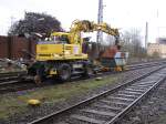 Gleisrckbau im Bahnhof Frstenhausen (Saar). Ein Liebherr A 900 ZW der Firma Monti transportiert und verteilt Split fr die neuen Randwege. Aufgenommen am 24.03.2007