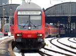 Ausfahrt von RE4 am 17.02.2010, geschoben von 111 151-7, aus dem Aachener Hbf.