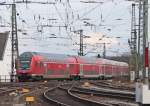 Der sptere RE10133 nach Hamm trifft aus seiner Vorleistung mit Schublok 146 002 in Aachen Hbf ein 28.3.10