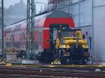 Der neue 2Wegeunimog ( U400) mit Rangierkupplungen am 21.01.2011 am Aachener Hbf.