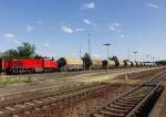 Eine MaK G 1206 der Captrain Deutschland GmbH wartet mit leeren Silowagen am 09.07.2012 im Bahnhof von Aulendorf auf die Weiterfahrt Richtung Ulm.