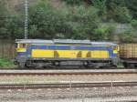 753 731-9 der AWT steht am 09. August 2012 mit einem Containerzug im Bahnhof Bad Schandau.