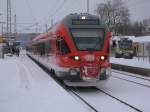 429 030 und der PRESS VT650 032,am 06.Dezember 2012,in Bergen/Rgen.Beide Zge fuhren trotz Wintereinbruch pnktlich.