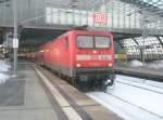 Hier 112 113-6 mit einem RE1 nach Eisenhttenstadt, bei der Ausfahrt am 3.2.2010 aus Berlin Hbf.