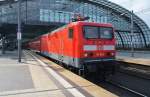 Hier 114 022 mit einer RB14 (RB18927) von Nauen nach Berlin Schönefeld Flughafen, bei der Ausfahrt am 6.4.2012 aus Berlin Hbf.