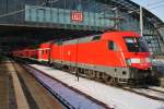 Hier 182 008 mit einem RE1 (RE18116) von Frankfurt(Oder) nach Magdeburg Hbf., bei der Einfahrt am 1.2.2014 in Berlin Hbf.