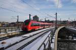 Hier 442 818-1 als RE7 (RE18715) von Wünsdorf-Waldstadt nach Bad Belzig, bei der Einfahrt am 1.2.2014 in Berlin Hbf.