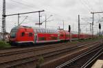 Hier ein RE1 (RE18118) von Frankfurt(Oder) nach Magdeburg Hbf., bei der Einfahrt am 29.6.2013 in Berlin Ostbahnhof.