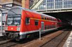 Hier eine RB14 (RB18915)  Airport-Express  von Nauen nach Berlin Schönefeld Flughafen, bei der Ausfahrt am 28.6.2014 aus Berlin Ostbahnhof.