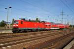 Hier 143 947-0 mit einer RB14 (RB28756) von Senftenberg nach Berlin Schönefeld Flughafen, bei der Einfahrt am 3.10.2012 in Berlin Schönefeld Flughafen.	