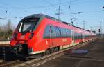 Hier 442 829-8 als RE7 (RE18713) von Wünsdorf-Waldstadt nach Dessau Hbf., bei der Ausfahrt am 6.2.2013 aus Berlin Schönefeld Flughafen.