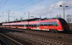 Hier 442 827-2 als RE7 (RE18716) von Dessau Hbf. nach Wünsdorf-Waldstadt, bei der Einfahrt am 6.2.2013 in Berlin Schönefeld Flughafen. 