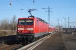 Hier 143 834-0 mit einer RB14 (RB18914) von Berlin Schönefeld Flughafen nach Nauen, bei der Ausfahrt am 6.2.2013 aus Berlin Schönefeld Flughafen.