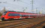 Hier 442 824-9 als RE7 (RE18718) von Dessau Hbf. nach Wünsdorf-Waldstadt, bei der Einfahrt am 6.2.2013 in Berlin Schönefeld Flughafen.