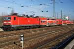 Hier 143 569-2 mit einer RB14 (RB18564) von Senftenberg nach Berlin Schönefeld Flughafen, bei der Einfahrt am 6.2.2013 in Berlin Schönefeld Flughafen.