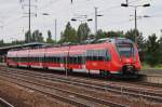 Hier 442 319-0 als RB19 (RB18566)  Airport-Express  von Senftenberg nach Berlin Gesundbrunnen, bei der Einfahrt am 14.6.2014 in Berlin Schönefeld Flughafen.