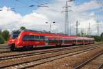 Hier 442 328-1  Wildau  als RE7 (RE18720)  Airport-Express  von Bad Belzig nach Berlin Schönefeld Flughafen, bei der Einfahrt am 14.6.2014 in Berlin Schönefeld Flughafen.