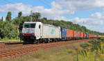 Am 27.August 2012 durchquerte ITL E186 138 mit einem Containerzug Berlin-Friedrichshagen Richtung Westen.