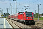 Nachschuss auf 147 003-8 von DB Regio Baden-Württemberg als verspäteter RE 19057 von Lauda nach Stuttgart Hbf, der den Bahnhof Bietigheim-Bissingen auf Gleis 8 verlässt.