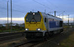 264 001 rangiert nach getaner Arbeit am Morgen des 18.11.17 in Bitterfeld auf´s Abstellgleis.