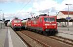 120 502 zieht am 02.03.10 nach einem kurzen Halt den Messzug aus dem Bahnhof Bitterfeld Richtung Leipzig.