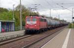 140 024 zieht am 18.05.10 einen Kesselwagenzug durch Burgkemnitz Richtung Bitterfeld.