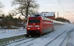 101 091 zieht am Morgen des 10.12.10 den IC 2351 nach Stralsund durch Burgkemnitz.