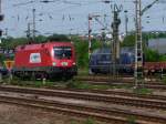 1116 237+Containerzug leer und 221 135 mit lehren Wagen und Getreide am 20.5.09 in Chemnitz HBF