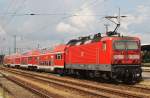 Hier 143 843-1 mit einer RB49/RE5 (RB28749/RE18514) von Cottbus nach Falkenberg(Elster)/Stralsund Hbf., bei der Ausfahrt am 11.7.2014 aus Cottbus. 