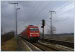 101 046 mit EC bei der Durchfahrt in Doberlug-Kirchhain, 14.03.2011 