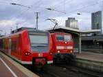 RE 3 mit 425 579-0 und RE 4 mit BR 111 111-1.(20.03.2009)