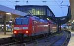 RE11027 nach Koblenz mit Schublok 146 018-7 in Duisburg Hbf 6.2.10