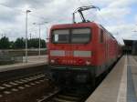 114 016 mit dem RE 18352 Wnstdorf Waldstadt-Schwedt,am 12.Mai 2012,beim Halt in Eberswalde.