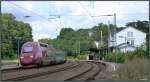 Elegant legt sich der Thalys in den Gleisbogen am Bahnhof von Eschweiler auf der Kbs 480.