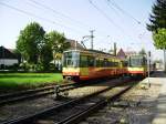 Am 24.09.2011 treffen sich AVG-Tw 578 als S1 nach Bad Herrenalb und Tw 557 als S1 nach Neureut im Bahnhof Ettlingen Albgaubad.