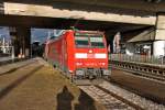 Einfahrt am 14.12.2013 in der Abendsonne von 146 116-9  Baden-Württemberg erfahren  mit einem RE nach Offenburg in Freiburg (Brsg) Hbf.