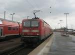 Hier 143 928-0 mit einer RB75 von Halle(Saale) Hbf. nach Nordhausen, bei der Ausfahrt am 5.4.2010 aus Halle(Saale) Hbf.