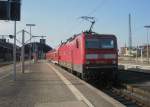 Hier 143 610-4 mit einem RE5 von Leipzig Hbf. nach Halle(Saale) Hbf., bei der Einfahrt am 6.4.2010 in Halle(Saale) Hbf.