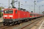 Hier 143 557-7 mit RB21164 von Hamburg-Altona nach Itzehoe, bei der Ausfahrt am 4.10.2013 aus Hamburg-Altona.