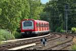 Zwei 472 der S-Bahn Hamburg als S21 von Hamburg-Bergedorf nach Hamburg Elbgaustraße erreichen den Hp Hamburg Dammtor auf der Hamburg-Altonaer Verbindungsbahn (KBS 137.1).