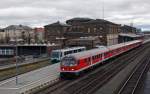 Der RE nach Leipzig verlsst mit Schublok 218 468 am 13.11.10 den Bahnhof Hof.