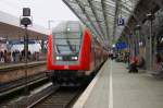 Ein Dosto Steuerwagen mit Rhein Express RE 5 (Emmerich - Koblenz Hbf)und als schublok ein 146 er in Kln Hbf am 28.09 2010.