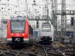 Parallelfahrt von 620 516 und 460 006-0 als MRB26 bei der Ausfahrt im Gleisfeld vom Kölner Hbf.